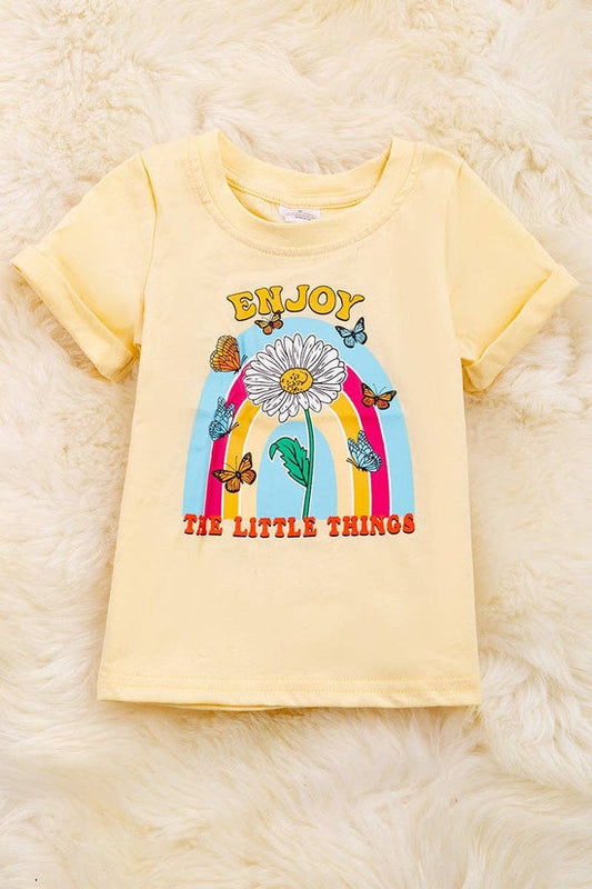 "Enjoy the little things" candle light color printed tee shirt with folded sleeves.